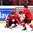 HELSINKI, FINLAND - DECEMBER 27: Switzerland's Pius Suter #24 blocks a shot in front of Denis Malgin #13 on an empty net attempt by Team Denmark during preliminary round action at the 2016 IIHF World Junior Championship. (Photo by Matt Zambonin/HHOF-IIHF Images)

